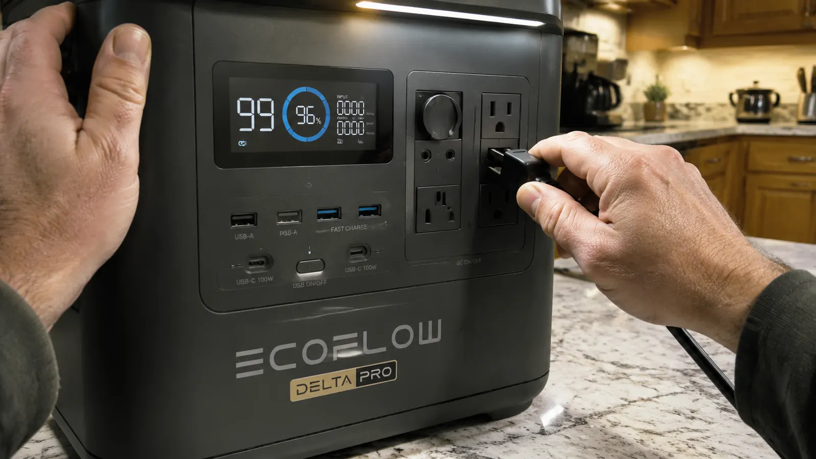 Hand plugging a refrigerator power cord into the AC outlet of an EcoFlow Delta Pro power station in a kitchen