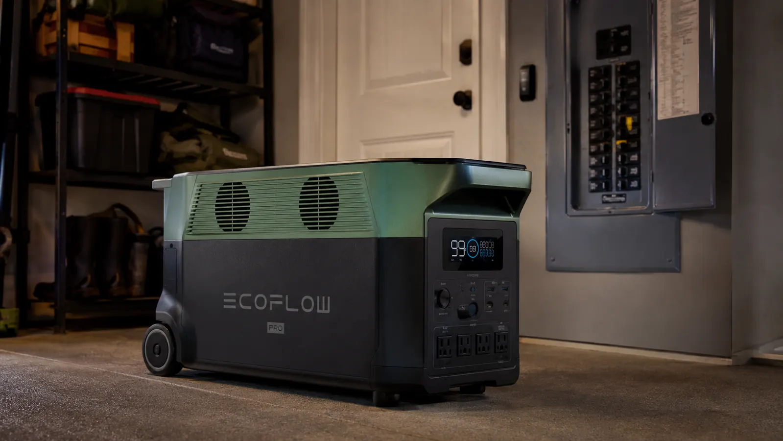 EcoFlow Delta Pro power station sitting on a garage floor next to a home circuit panel, emergency prep setting